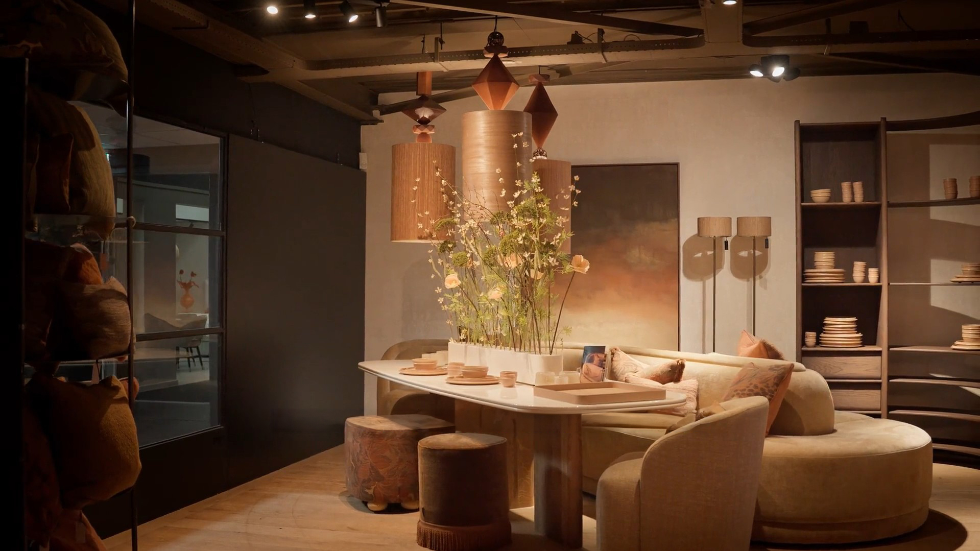 BigBeads pendants above a dining table in the Duran showroom