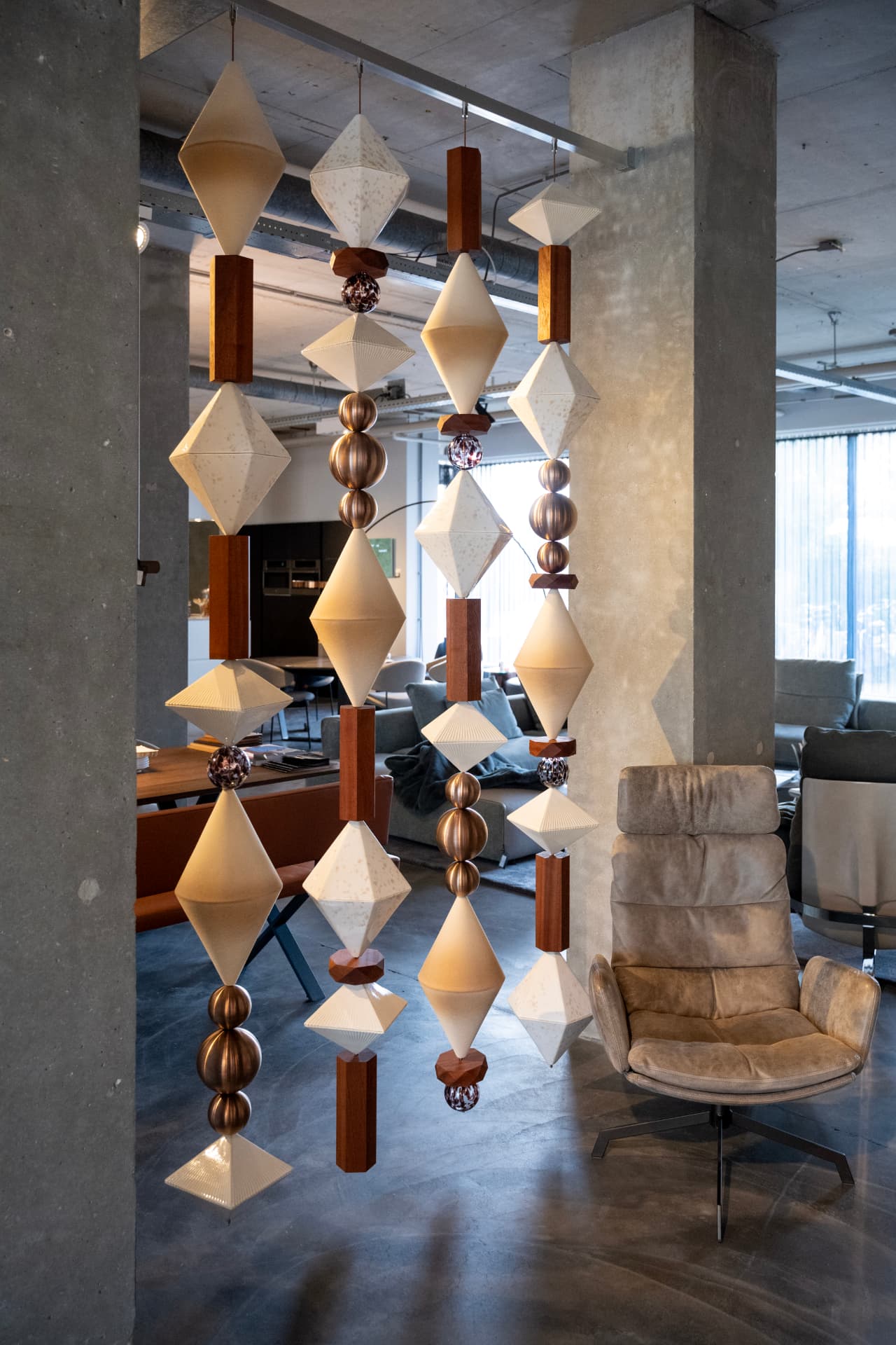 Four BigBeads strands in a concrete showroom