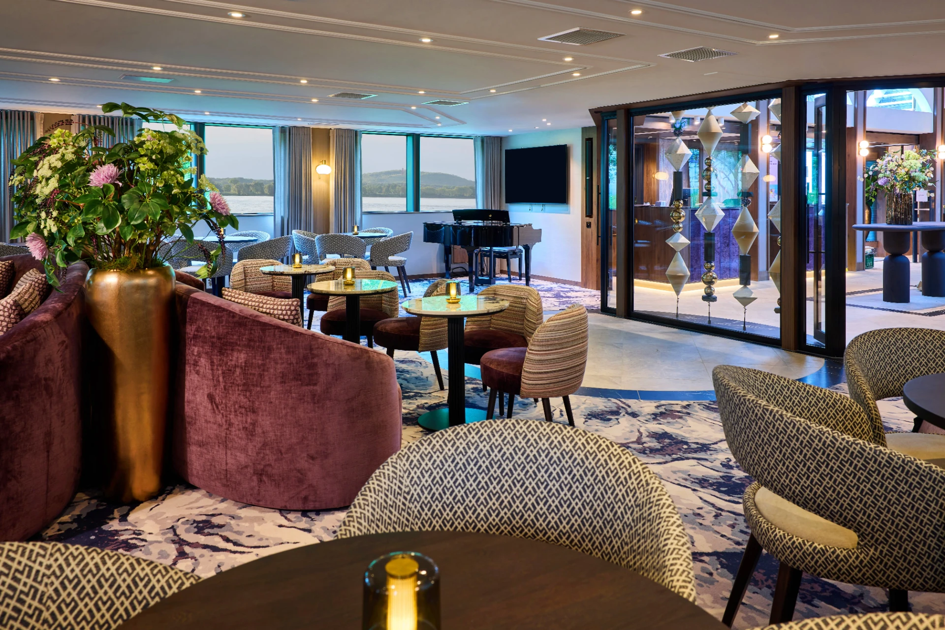 Viva Beyond lounge with BigBeads strands behind glass
