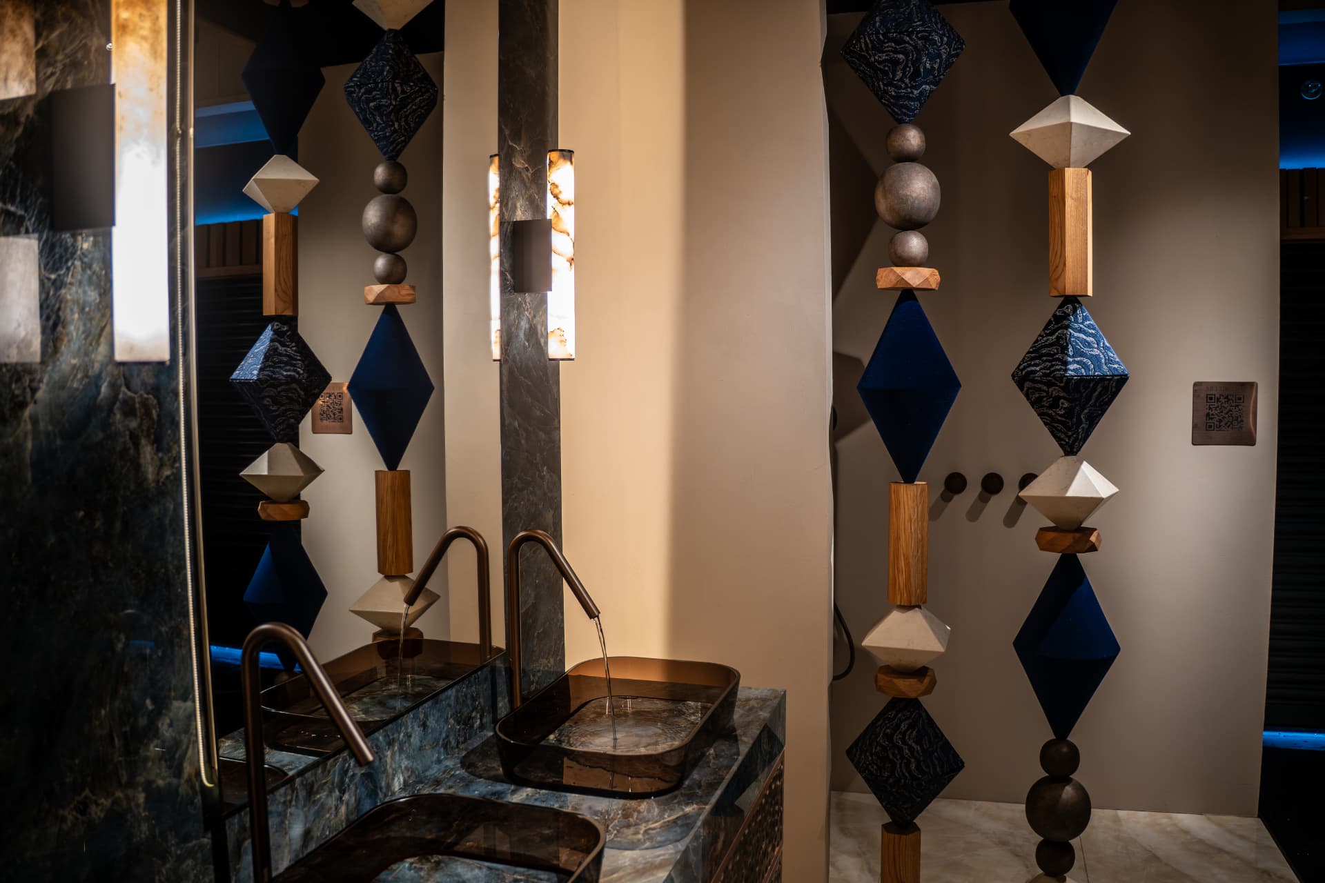 Blue BigBeads strands in a dark bathroom setting